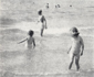Children paddle in the sea, Worthing c1952