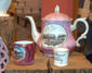 Teapot and mugs with views of Worthing c1890
