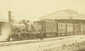 Train with steam locomotive at Barnham c1864