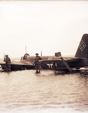 Nazi plane in sea with two guards, Pagham, 1940