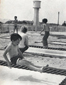 Children bounce on trampolines, Littlehampton c1974