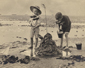 Boys building a sandcastle on the beach, Worthing 1930