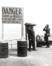 Sign warns to stay away from beach, c1941