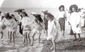 Children paddling on Worthing beach 1900