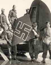 Home Guard with swastika from crashed German plane, Pagham 1940