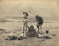 Boys building a sandcastle on the beach, Worthing